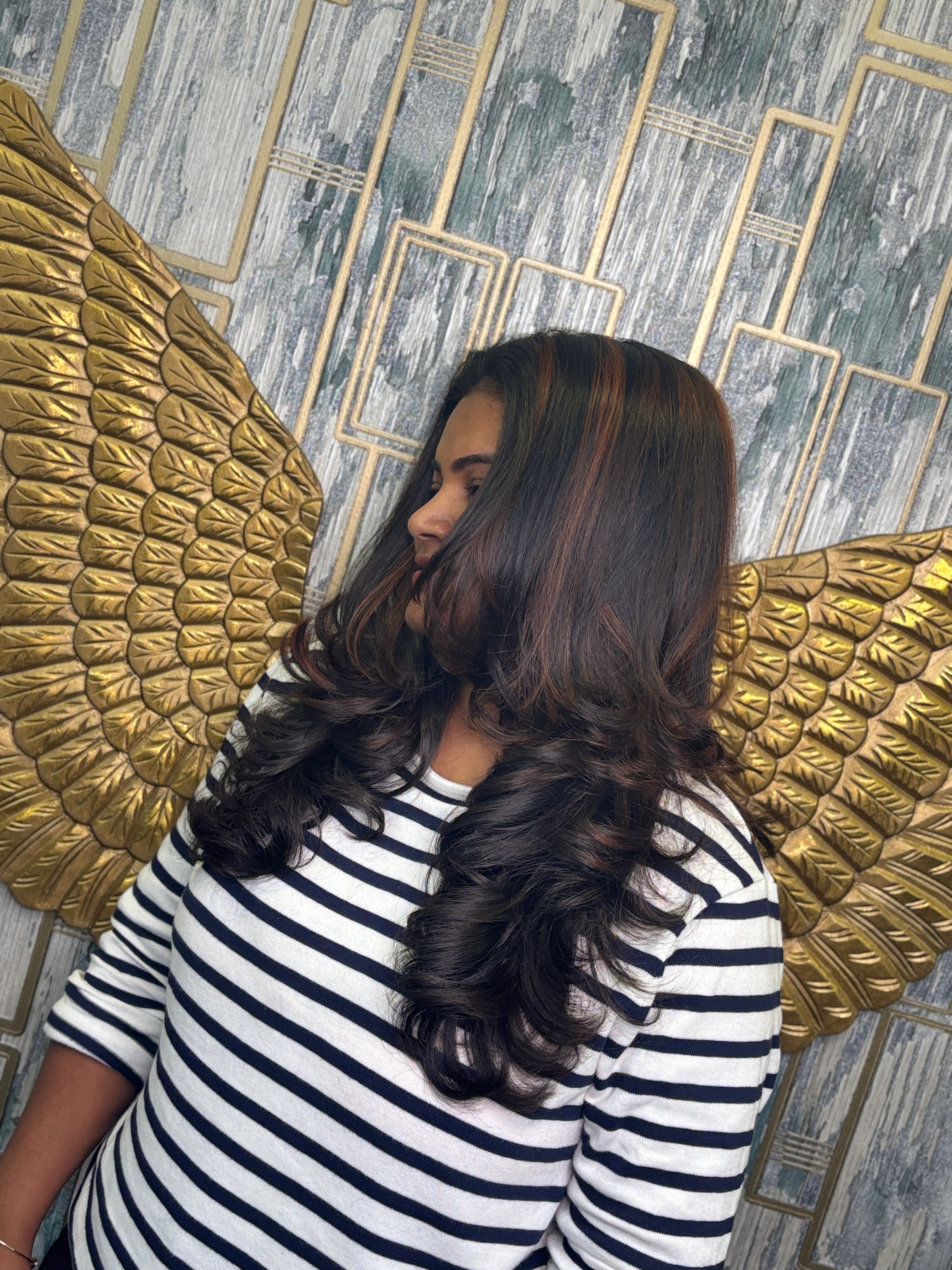 "Transform Your Hair with Layer Cuts and Highlights"