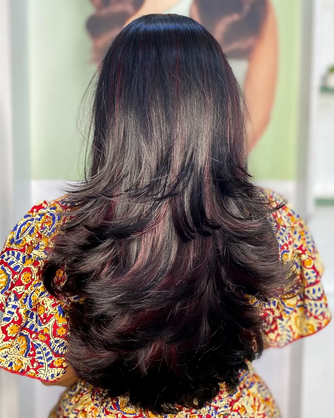 Layer Cut with Red Velvet Highlights at Marvel Salon Thoraipakkam – A Bold Hair Transformation Experience